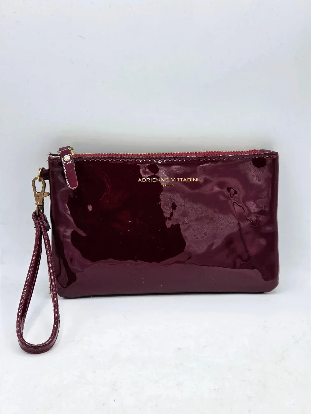 Adrienne Vittadini Burgundy Patent Leather Charging Wristlet Power Bank Clutch